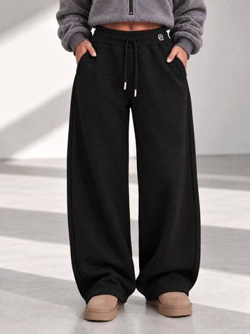Брюки женские Kenalin 2210-1 утепленные на флисе спортивные baggy широкие на резинке черные 2210-1 фото