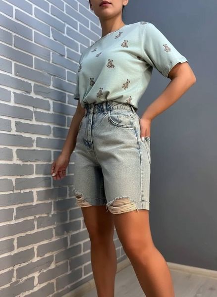 Шорти жіночі джинсові Women Denim 355-973 середньої довжини рвані світло-блакитні 355-973 фото